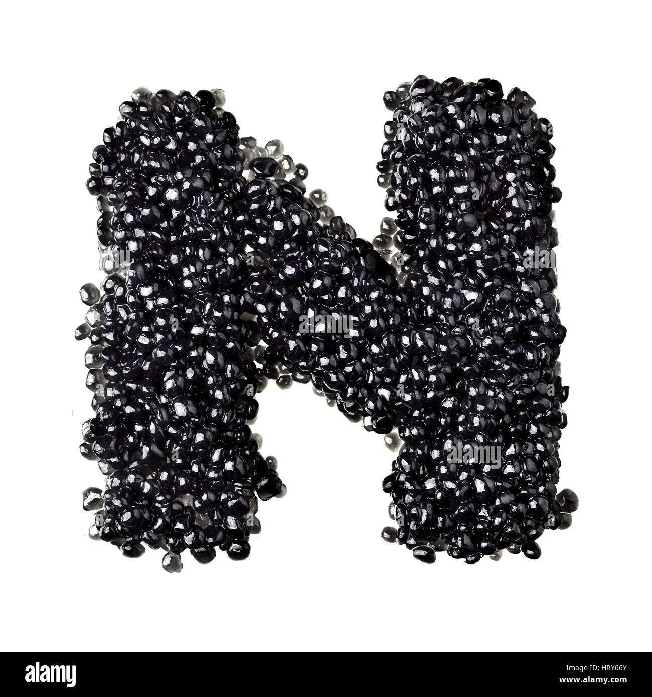 N - Alphabet made from black caviar Stock Photo