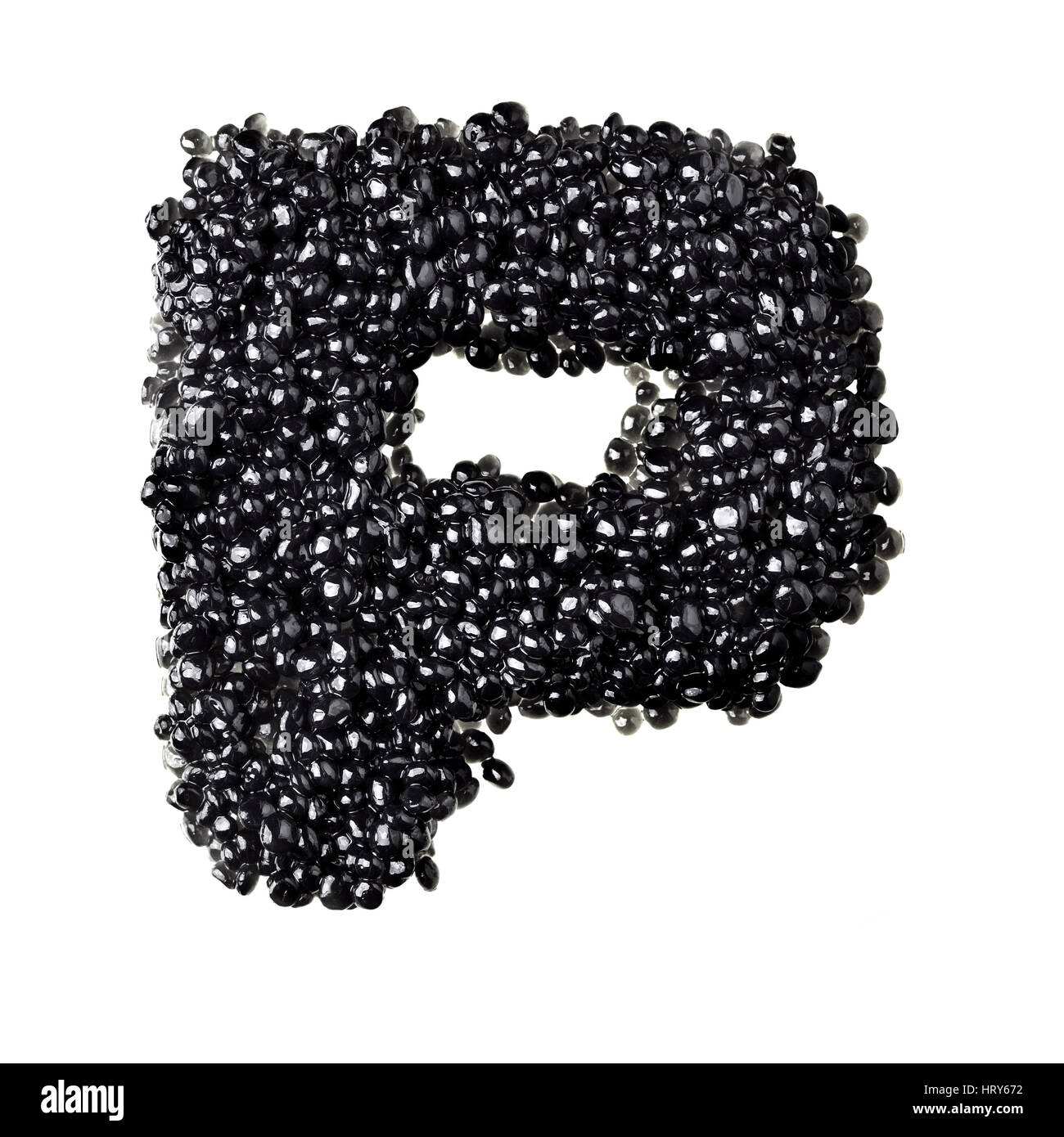 P - Alphabet made from black caviar Stock Photo