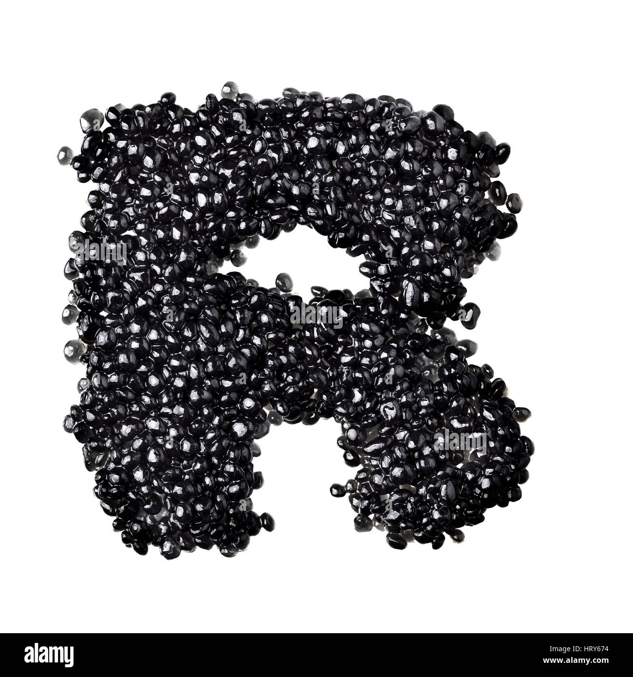 R - Alphabet made from black caviar Stock Photo