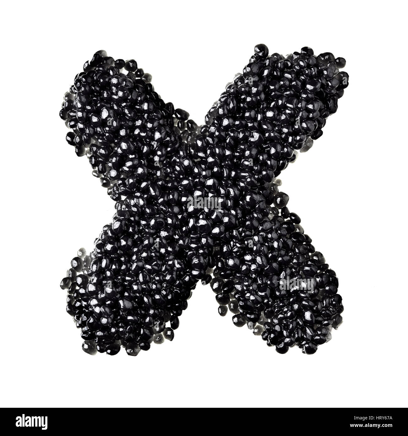 X - Alphabet made from black caviar Stock Photo