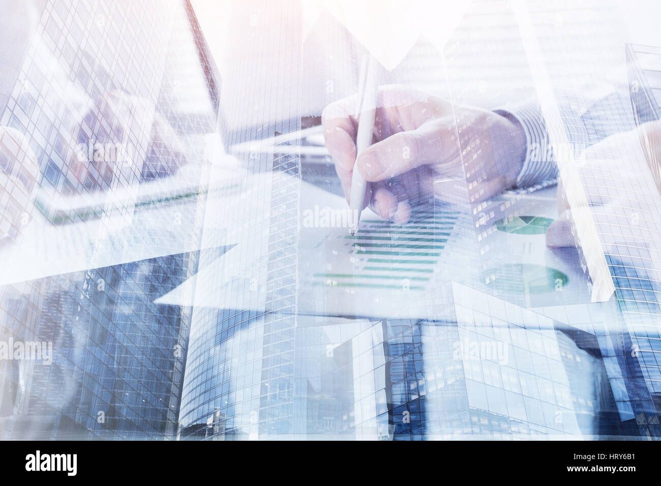 business people working in the office, double exposure of hands closeup, monitoring and analytics Stock Photo