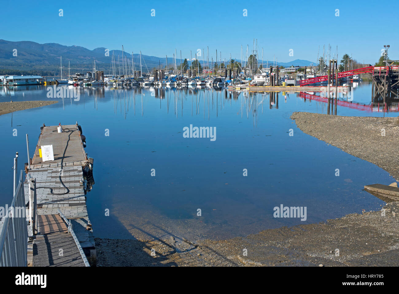 Commercial fishing and aquaculture vessels at the Deep Bay Moorings on Vancouver Island,BC.Canada Stock Photo