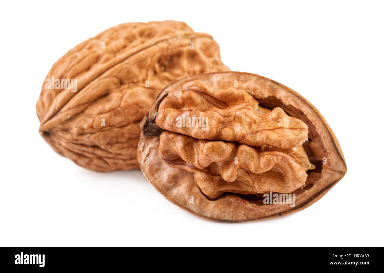 nuts walnuts whole and half in closeup Stock Photo