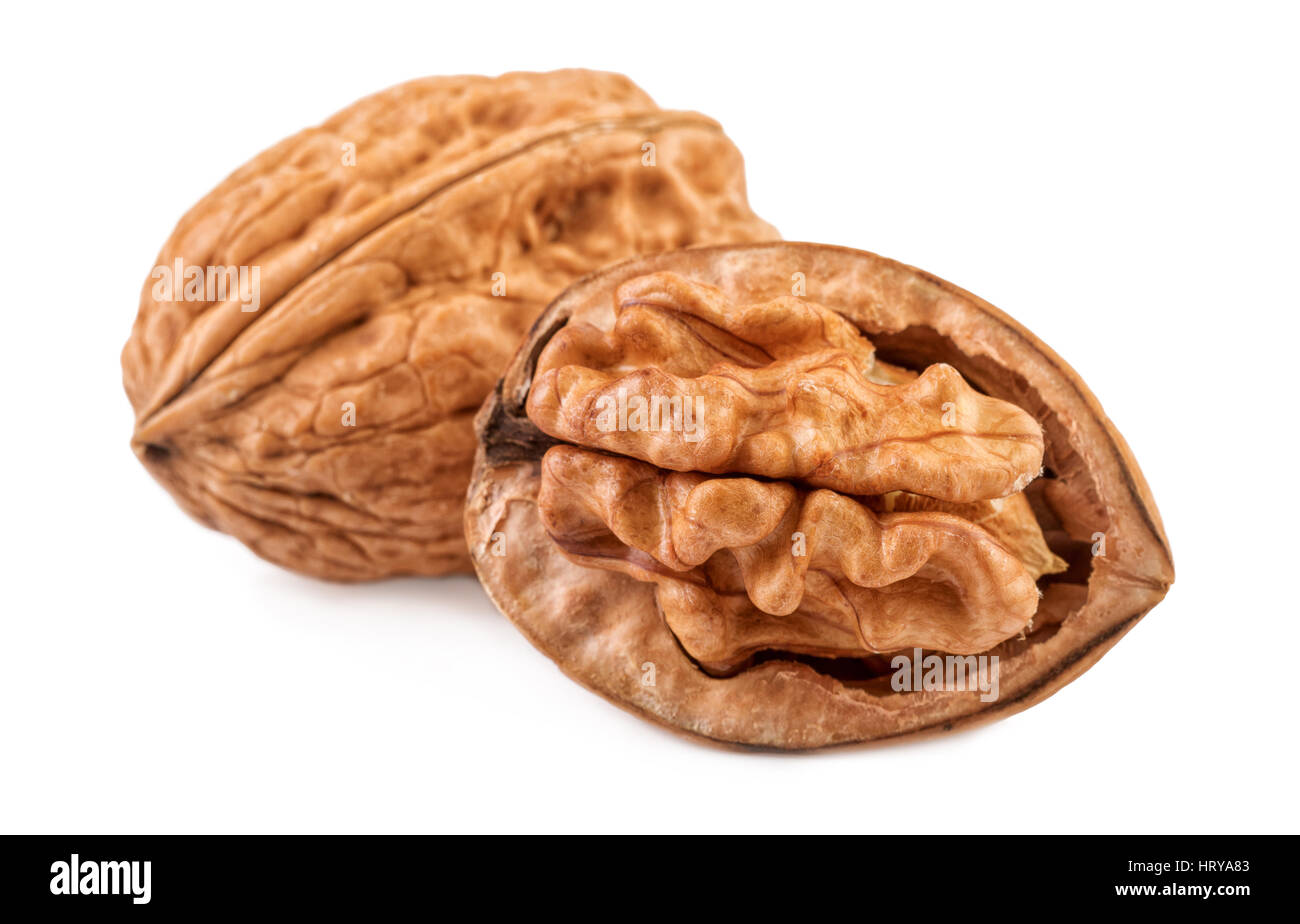 nuts walnuts whole and half in closeup Stock Photo Alamy