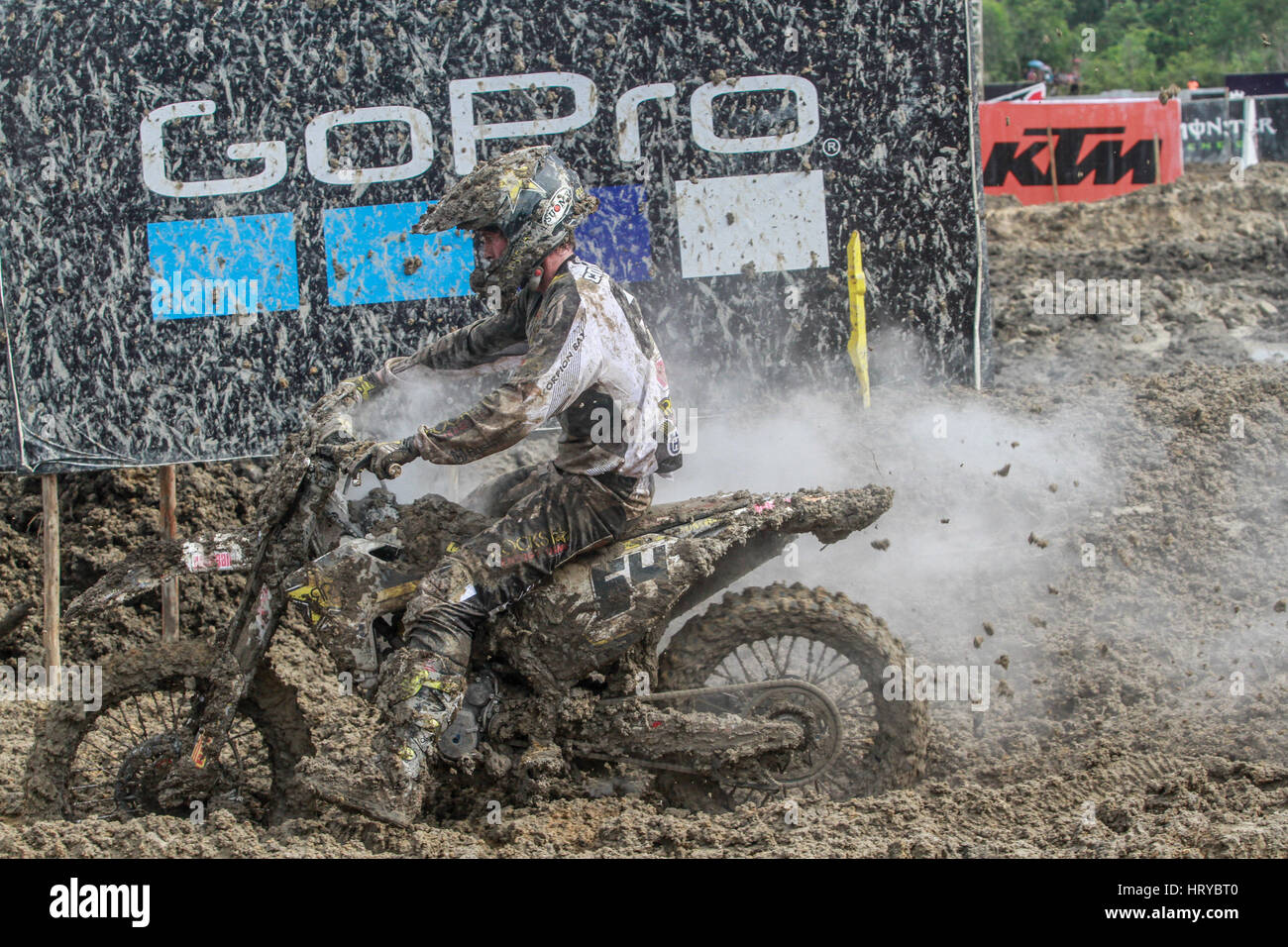 Pangkalpinang, Indonesia. 05th Mar, 2017. Racer covered in mud at motocross  MXGP Indonesia Grand Prix on March 5, 2017 in Pangkalpinang City.  Torrential rain ahead of the Grand Prix of Indonesia have