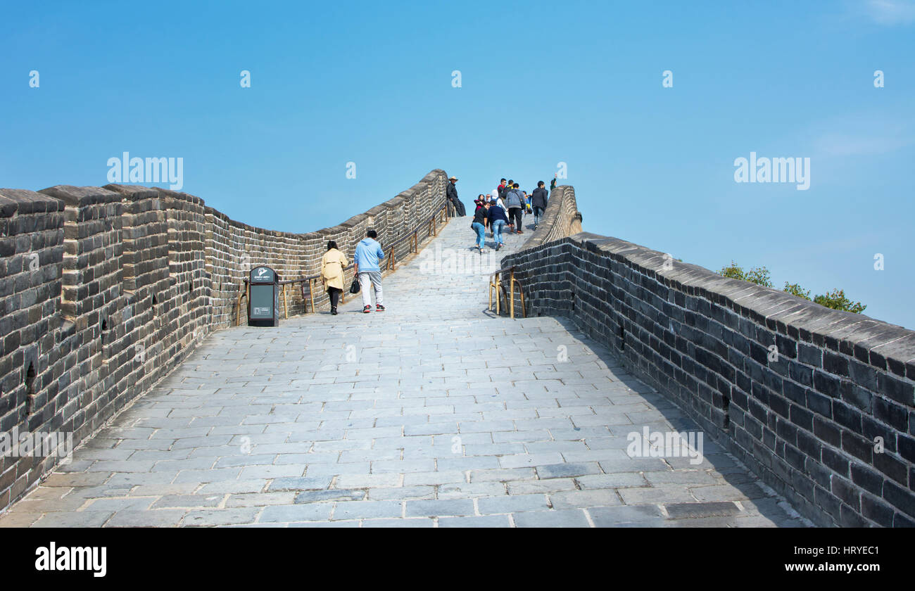 BEIJING, CHINA, SEPTEMBER,29, 2016: Tourists walking on the Great wall of China on a sunny day Stock Photo