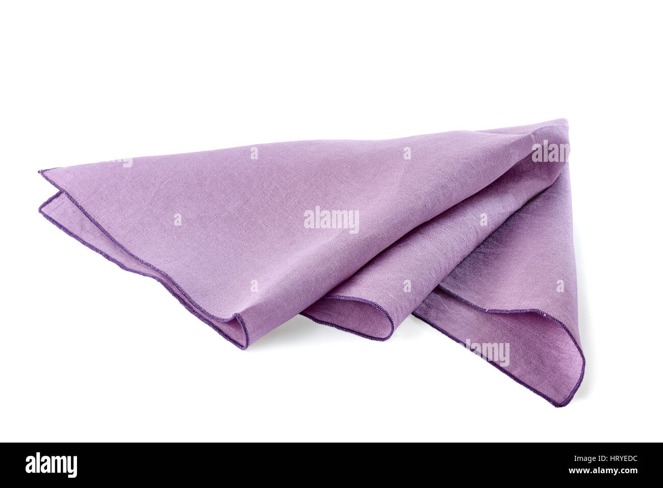 Crumpled violet textile napkin on white Stock Photo