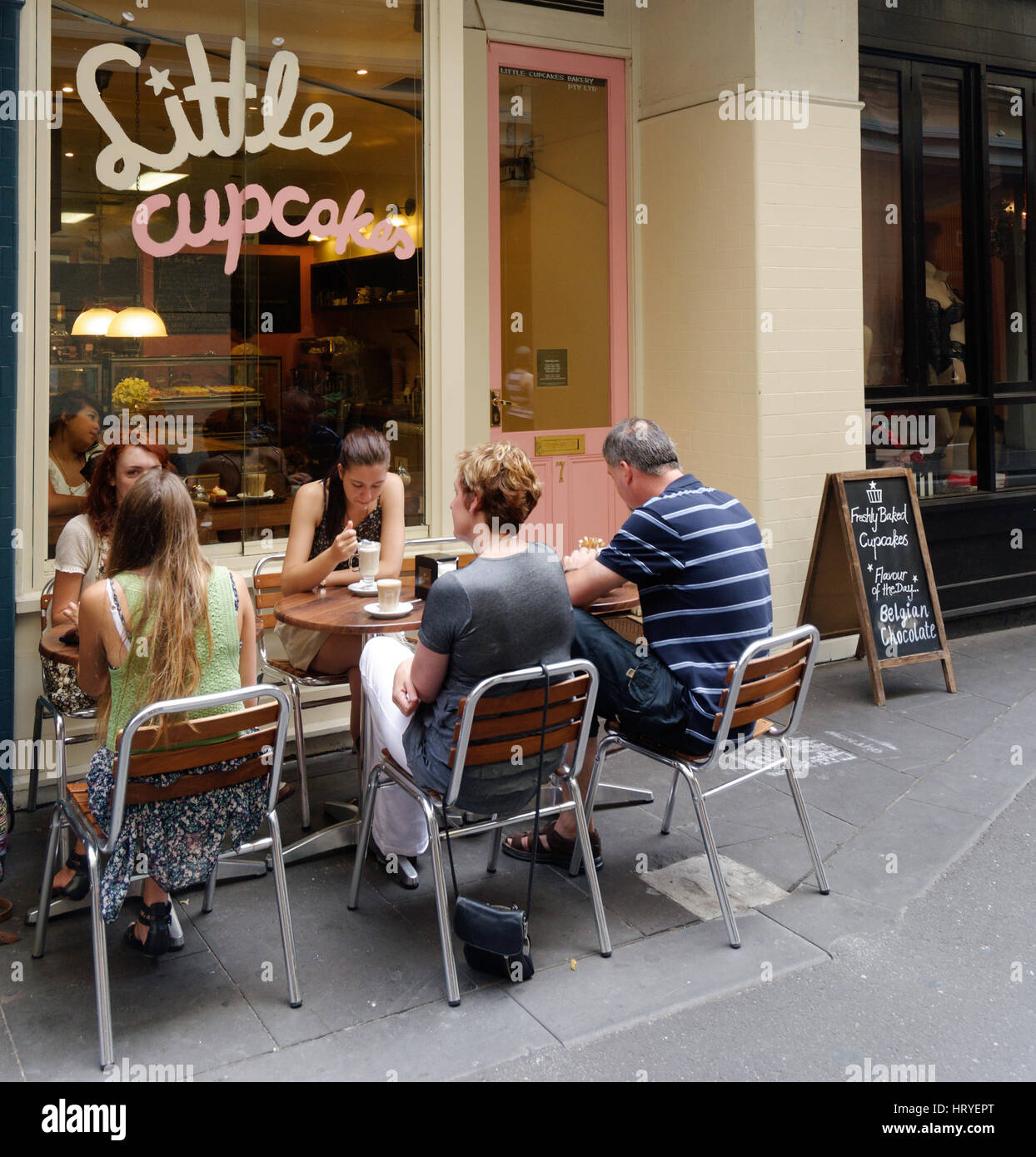 People drinking coffee outside a cupcake shop in Melbourne Australia Stock Photo Alamy