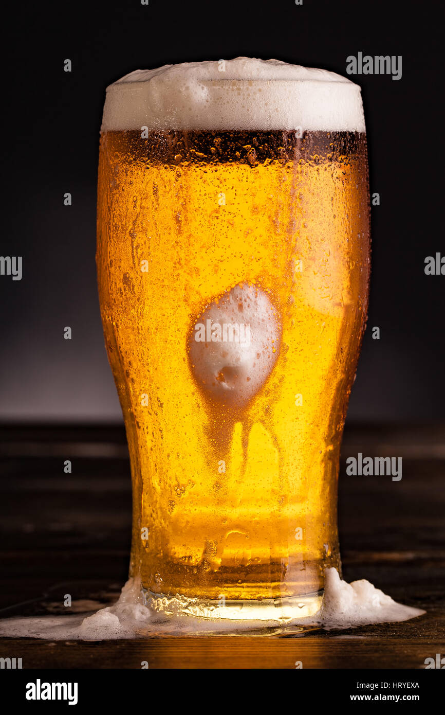 Fresh cold beer in a pint glass studio photographed in high detail 13