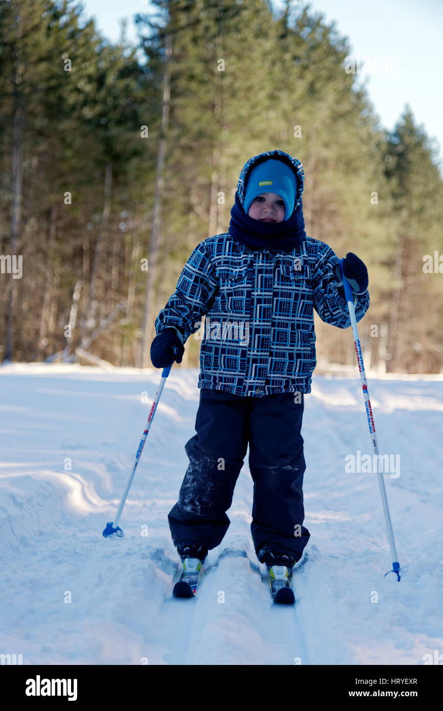 A young boy (4 yr old) cross country skiing Stock Photo