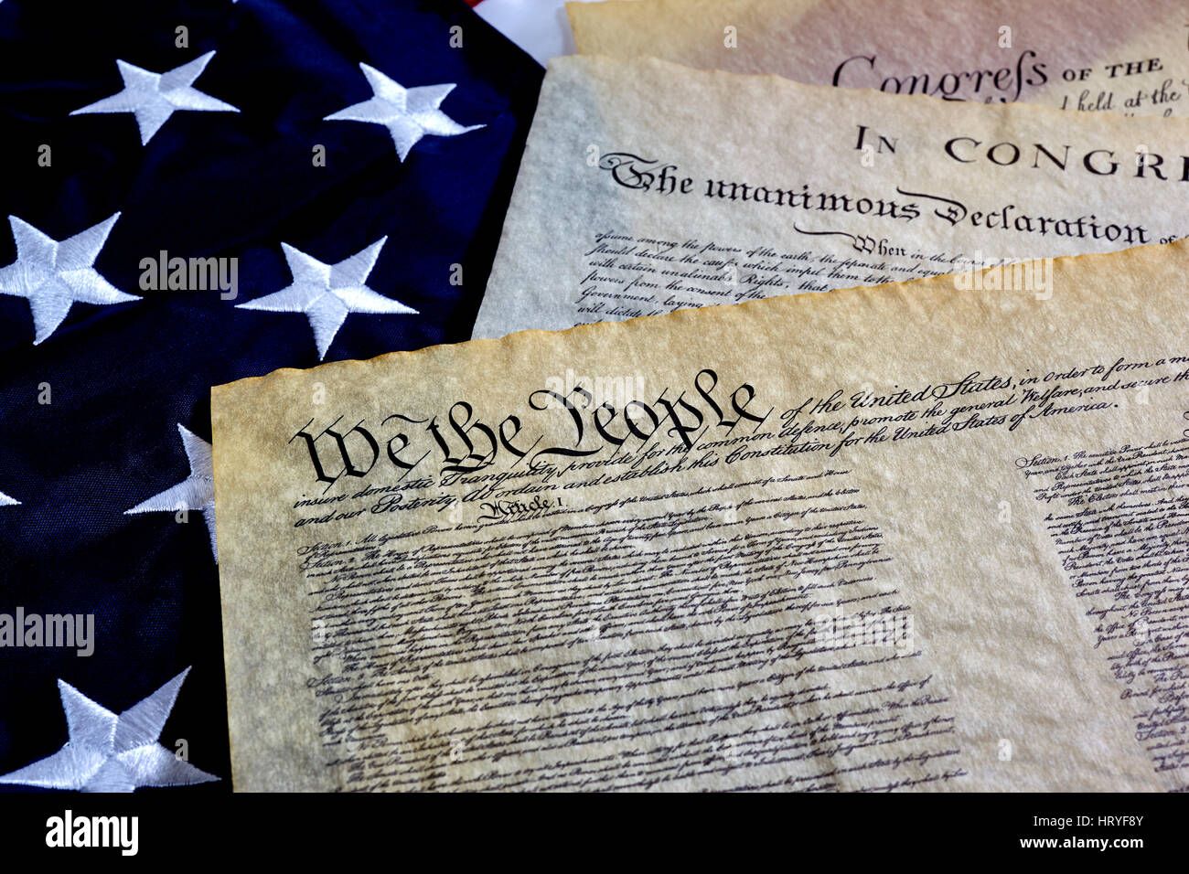 US Constitution with Bill of Rights and Declaration of Independence on an American Flag Stock Photo