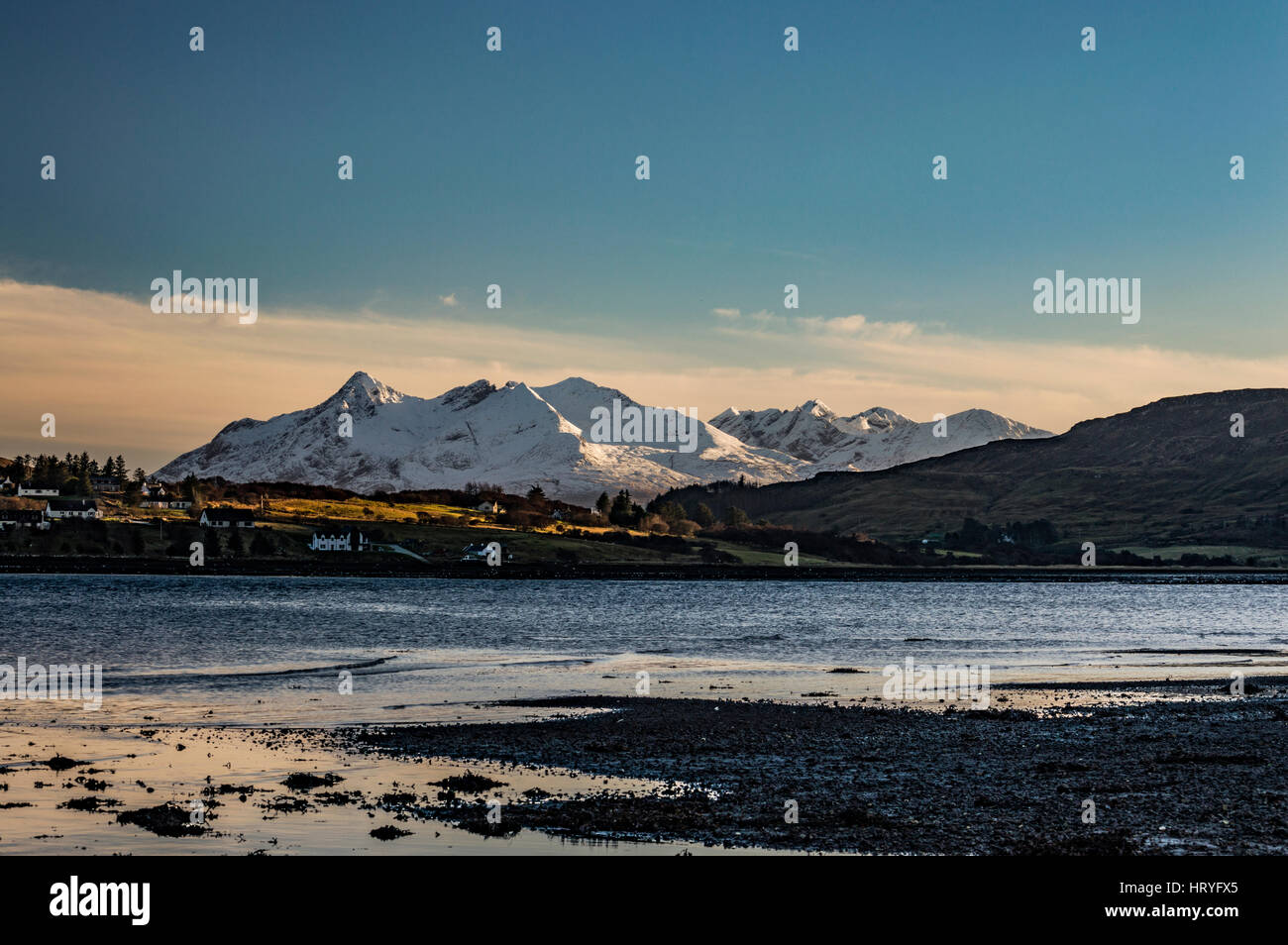 View of Cuillin Hills from Bayfield at Loch Portree, Isle of Skye, Scotland, on a winter's afternoon. Stock Photo