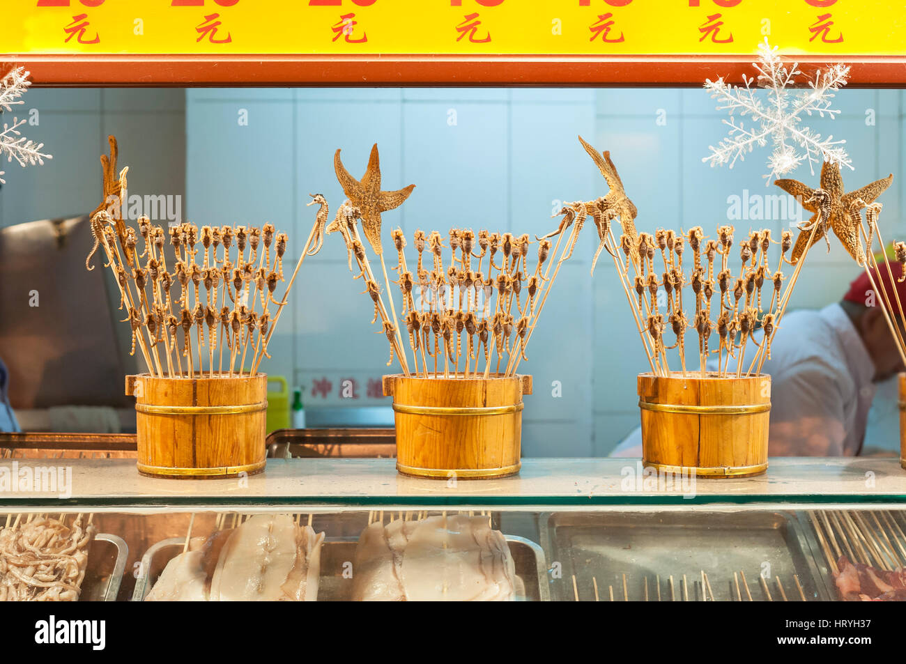 Scorpions on sticks and other weird snacks at Wangfujing snack street, Beijing Stock Photo