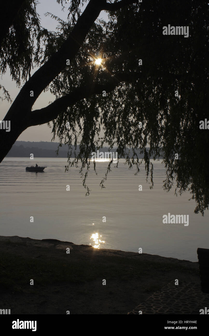 143 Tramonto sul lago di Viverone = Sunset on Lake Viverone Stock Photo