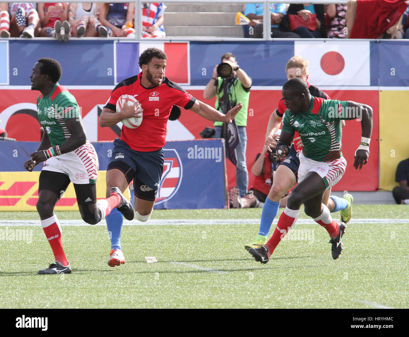 Las Vegas, Nevada, USA. 5th Mar, 2017. Russian Eme Patris Peke is tackled by Kenyan players during the 2017 USA Sevens International Rugby Tournament game between Kenya and Russia on March 4, 2017 at Sam Boyd Stadium in Las Vegas, Nevada Credit: Marcel Thomas/ZUMA Wire/Alamy Live News Stock Photo