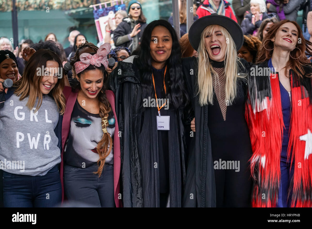 Melanie Chisholm, VV Brown, Natasha Bedingfieldand ,Kate Nash join the International Women's Day March, #march4women speaks and preforms demands equality pay for women and welcome seek refuges flees from war zone at the Scoop,London,UK. by See Li Stock Photo