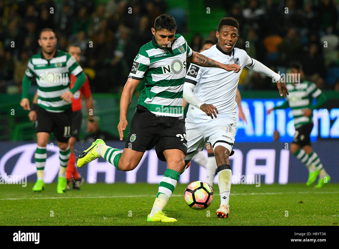 Portugal, Lisbon, Mar. 05, 2017 - FOOTBALL - Alan Ruiz (C), Sporting  player, shoots to score his goal during match between Sporting Clube de  Portugal and Vitória Guimarães for Portuguese Football League