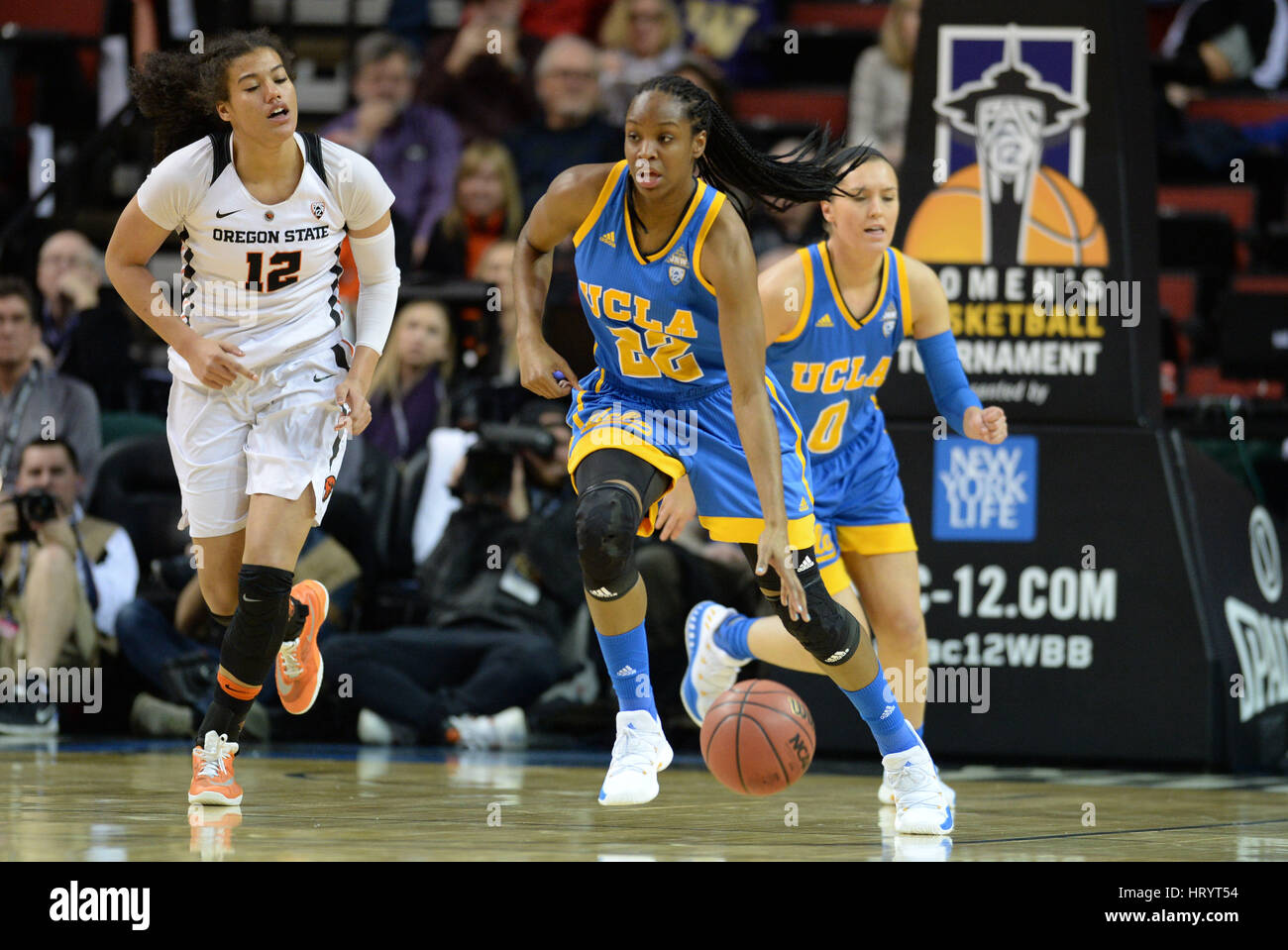 Seattle, WA, USA. 4th Mar, 2017. UCLA's Kennedy Burke (22) leads the fast break during a PAC12 women's tournament semi-final game between the Oregon State Beavers and the UCLA Bruins. The game was played at Key Arena in Seattle, WA. Jeff Halstead/CSM/Alamy Live News Stock Photo