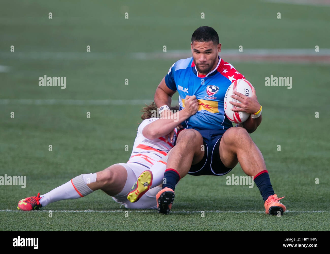 Las Vegas, NV, USA. 4th Mar, 2017. Martin Iosefo #12 of USA in action during Pool B play of the rugby sevens match between the USA and England at Sam Boyd Stadium in Las Vegas, Nv. England defeated the US 24-17. Damon Tarver/Cal Sport Media/Alamy Live News Stock Photo