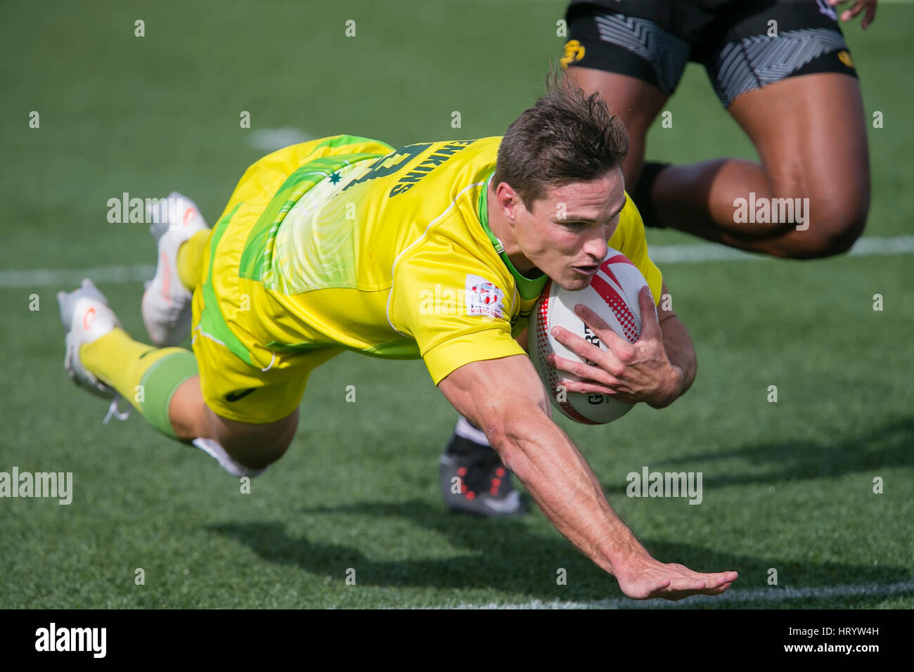 Las Vegas, NV, USA. 4th Mar, 2017. Ed Jenkins #9 of Australia dives in for a score during Pool D play of the rugby sevens match between Fiji and Australia at Sam Boyd Stadium in Las Vegas, Nv. Fiji defeated Australia 24-17. Damon Tarver/Cal Sport Media/Alamy Live News Stock Photo