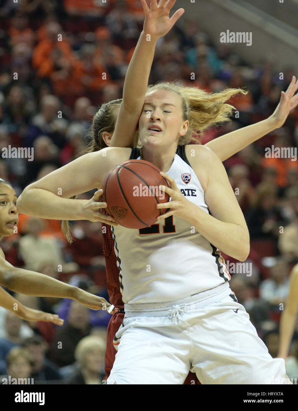 Seattle, WA, USA. 5th Mar, 2017. OSU center Marie Gulich (21) goes to the hoop against Stanford's Alanna Smith (11) during the PAC12 women's tournament final between the Oregon State Beavers and the Stanford Cardinal. The game was played at Key Arena in Seattle, WA. Jeff Halstead/CSM/Alamy Live News Stock Photo