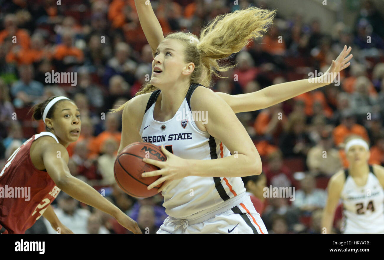 Seattle, WA, USA. 5th Mar, 2017. OSU center Marie Gulich (21) goes to the hoop during the PAC12 women's tournament final between the Oregon State Beavers and the Stanford Cardinal. The game was played at Key Arena in Seattle, WA. Jeff Halstead/CSM/Alamy Live News Stock Photo