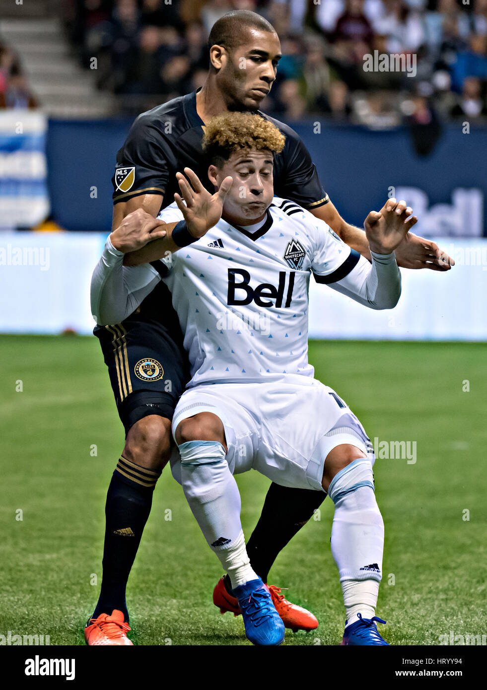 Vancouver, Vancouver. 5th Mar, 2017. Erik Hurtado(Front) of Vancouver Whitecaps vies with Oguchi Onyewu of Philadelphia Union during their Major League Soccer (MLS) match at BC Place, Vancouver, Canada on March 5, 2017. The match ended with a 0-0 draw. Credit: Andrew Soong/Xinhua/Alamy Live News Stock Photo
