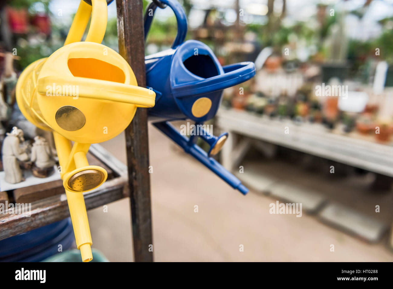 Hanging watering cans hires stock photography and images Alamy