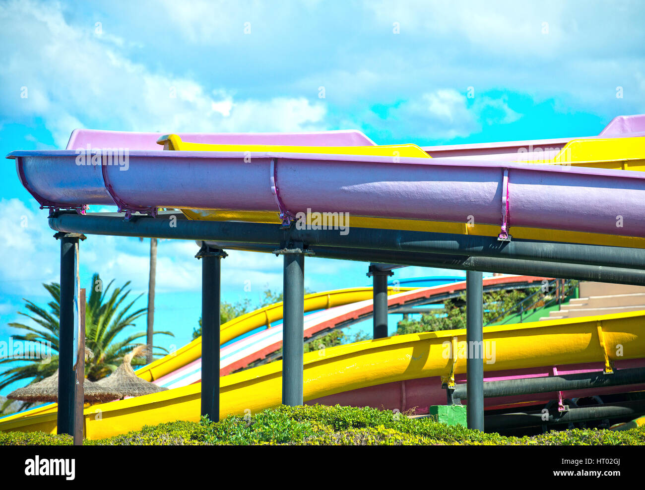 Colorful plastic waterslides in amusement park Stock Photo Alamy