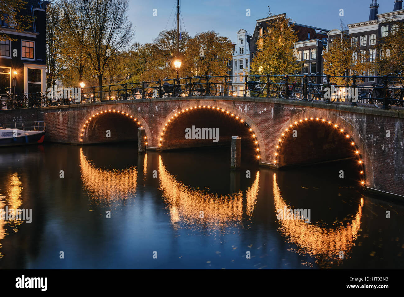 Blue Hour in Amsterdam, gives romantic mood. Stock Photo