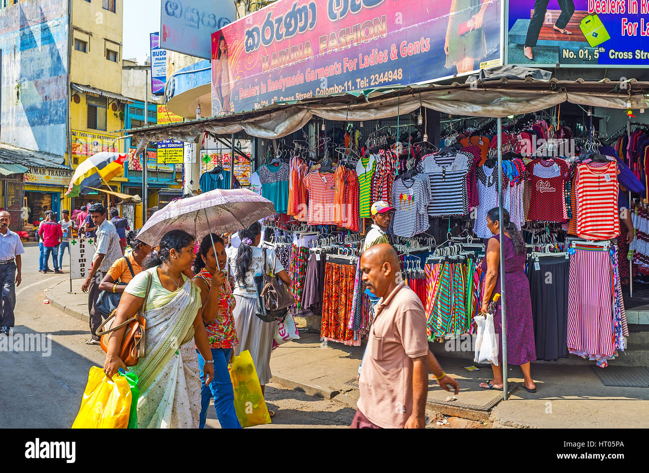 COLOMBO, SRI LANKA - DECEMBER 6, 2016: The cheap clothes market in 5th Cross street of Pettah district attracts locals and tourists, visiting the city Stock Photo