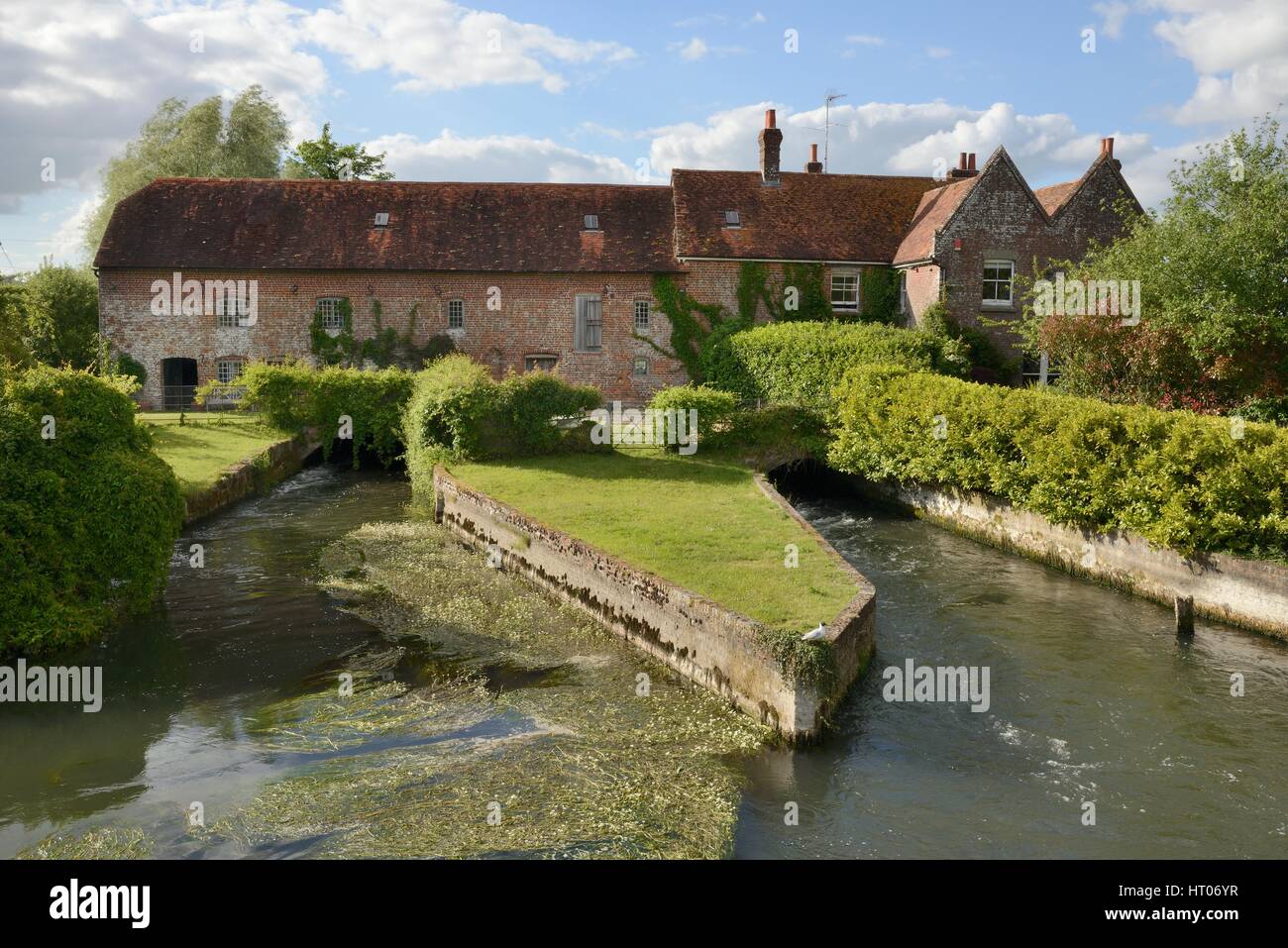 Old water mill over the River Avon, Breamore, Hampshire, UK, June 2015