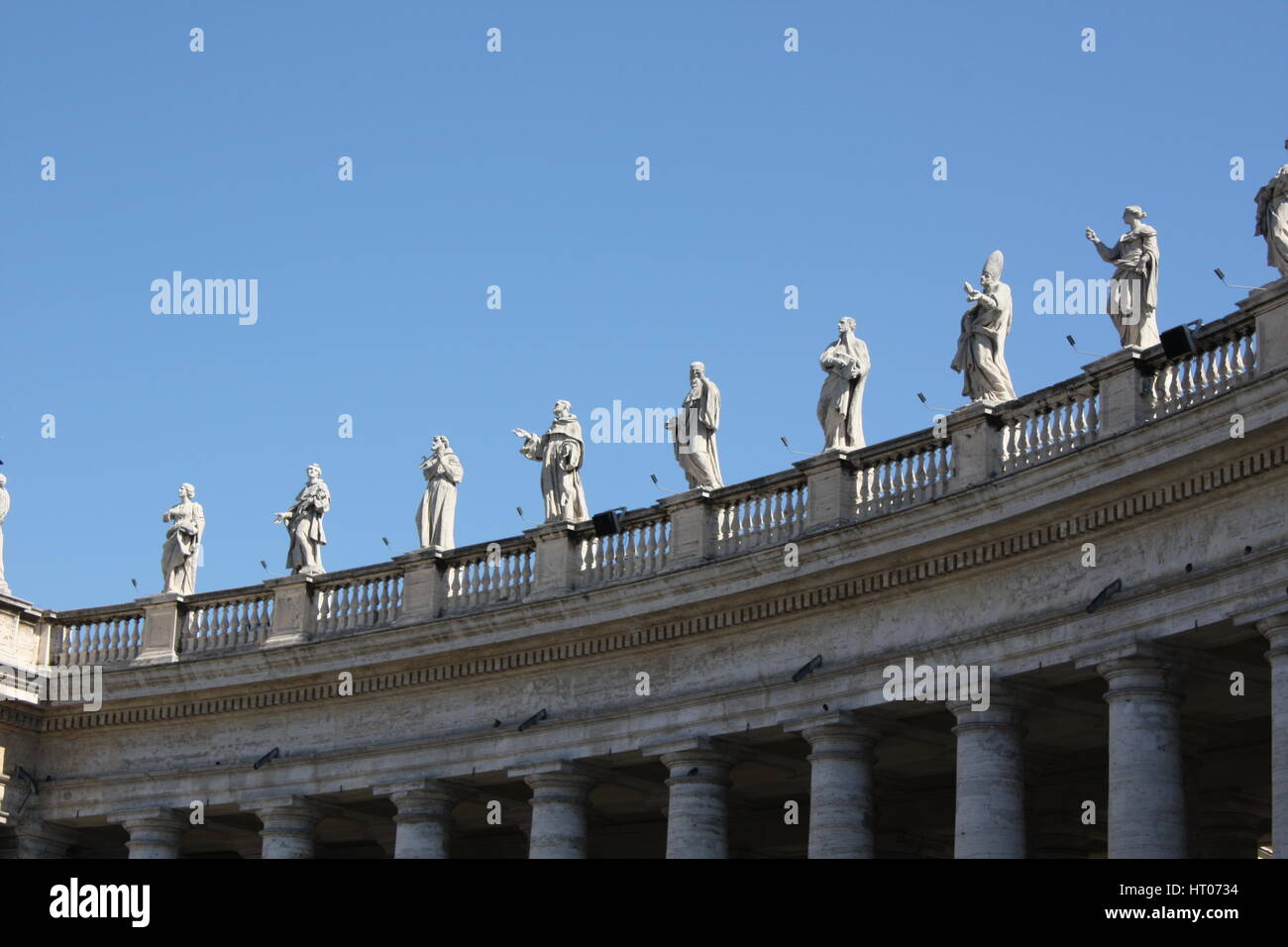 Statues on top of the colonnade of St. Peter Basilica's square in Rome, Italy Stock Photo Alamy