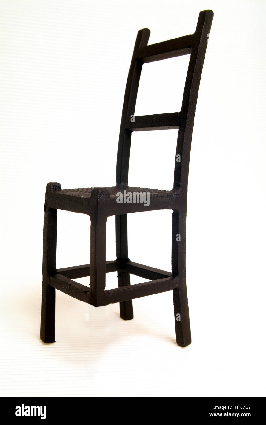 angesaegtes Stuhlbein - notching leg of a chair Stock Photo