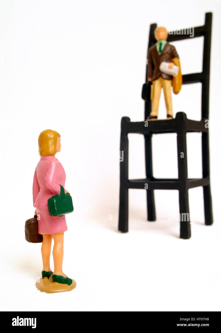 Symbolbild Ungleichgewicht zwischen Mann und Frau in der Wirtschaft, im Business - symbolic for discrimination of woman in economy, business Stock Photo