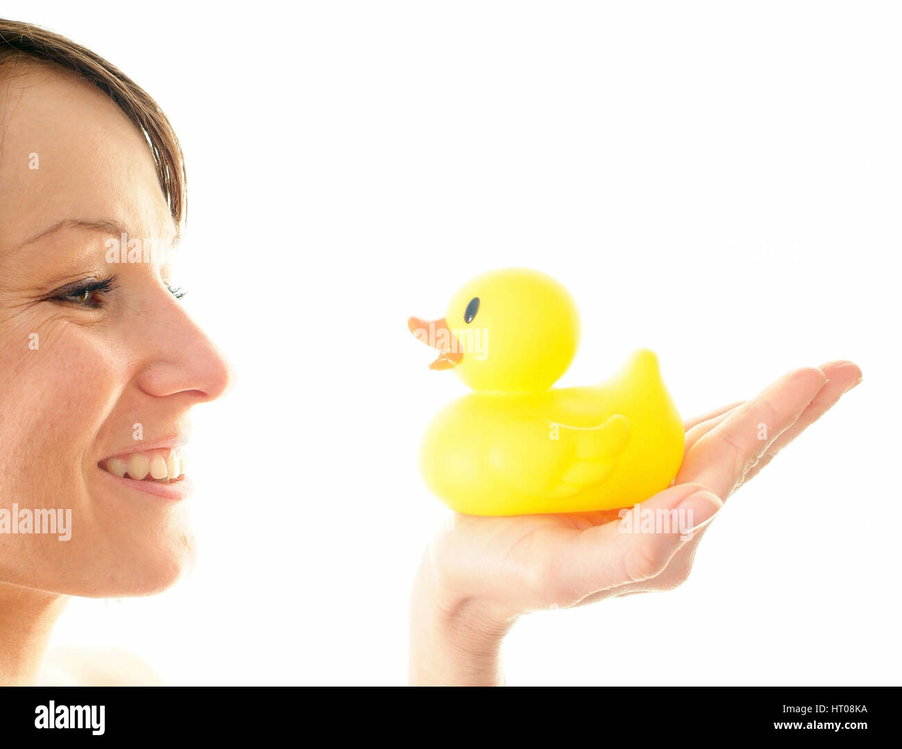 Junge Frau mit Badeente - young woman with rubber duck Stock Photo