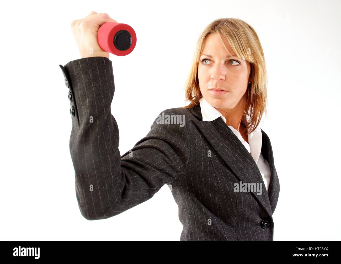 Junge Geschaeftsfrau mit Hanteln - young business woman with dumb bells Stock Photo