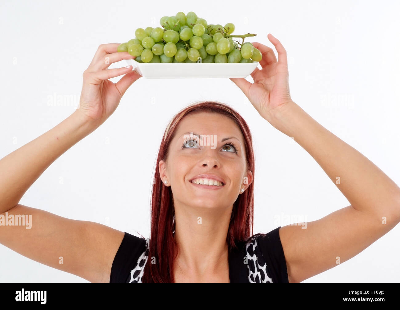 Junge Frau mit Weintrauben - young woman with grapes Stock Photo