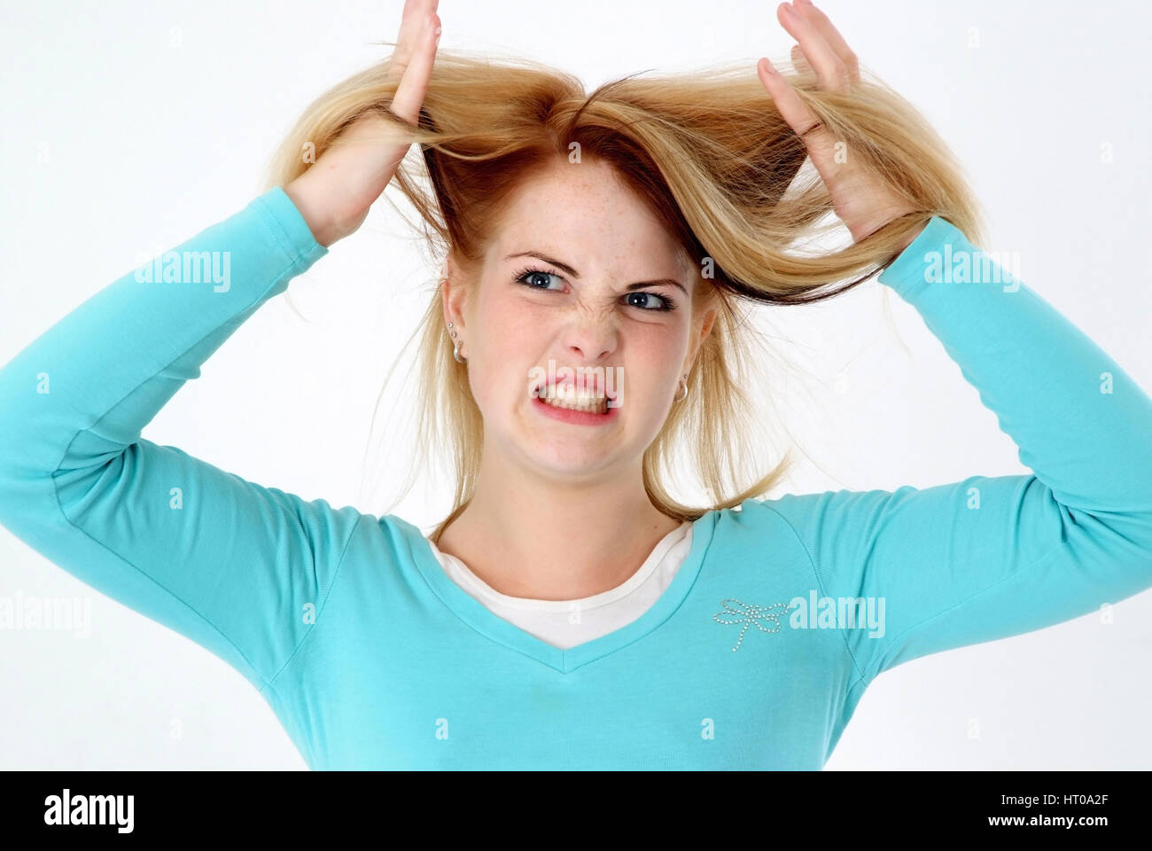Zornige Frau rauft sich die Haare - angry woman Stock Photo