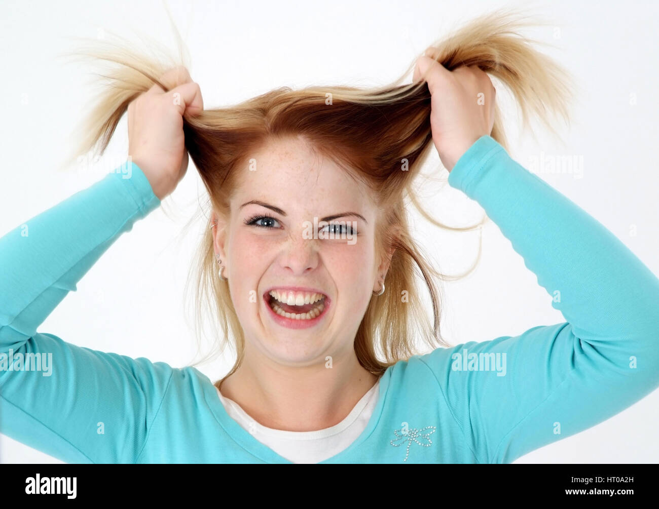 Zornige Frau rauft sich die Haare - angry woman Stock Photo