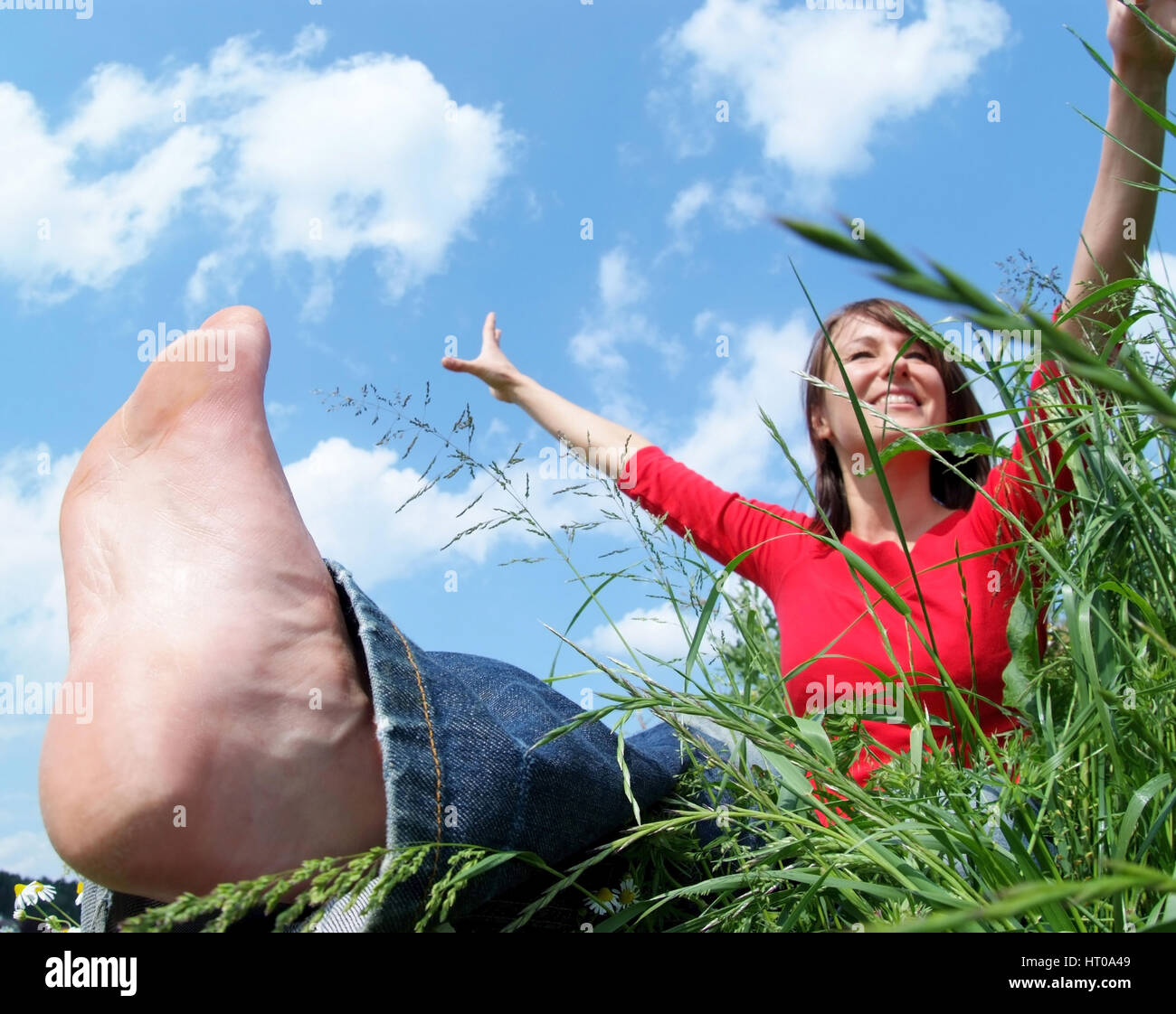 Junge Frau erholt sich in der Natur - woman relaxing in nature Stock Photo