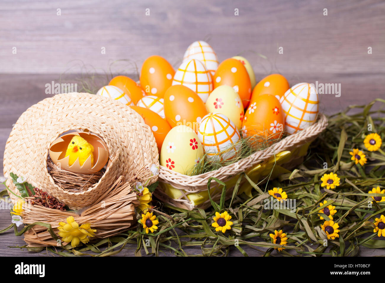 Easter decoration with eggs on a wooden background Stock Photo - Alamy