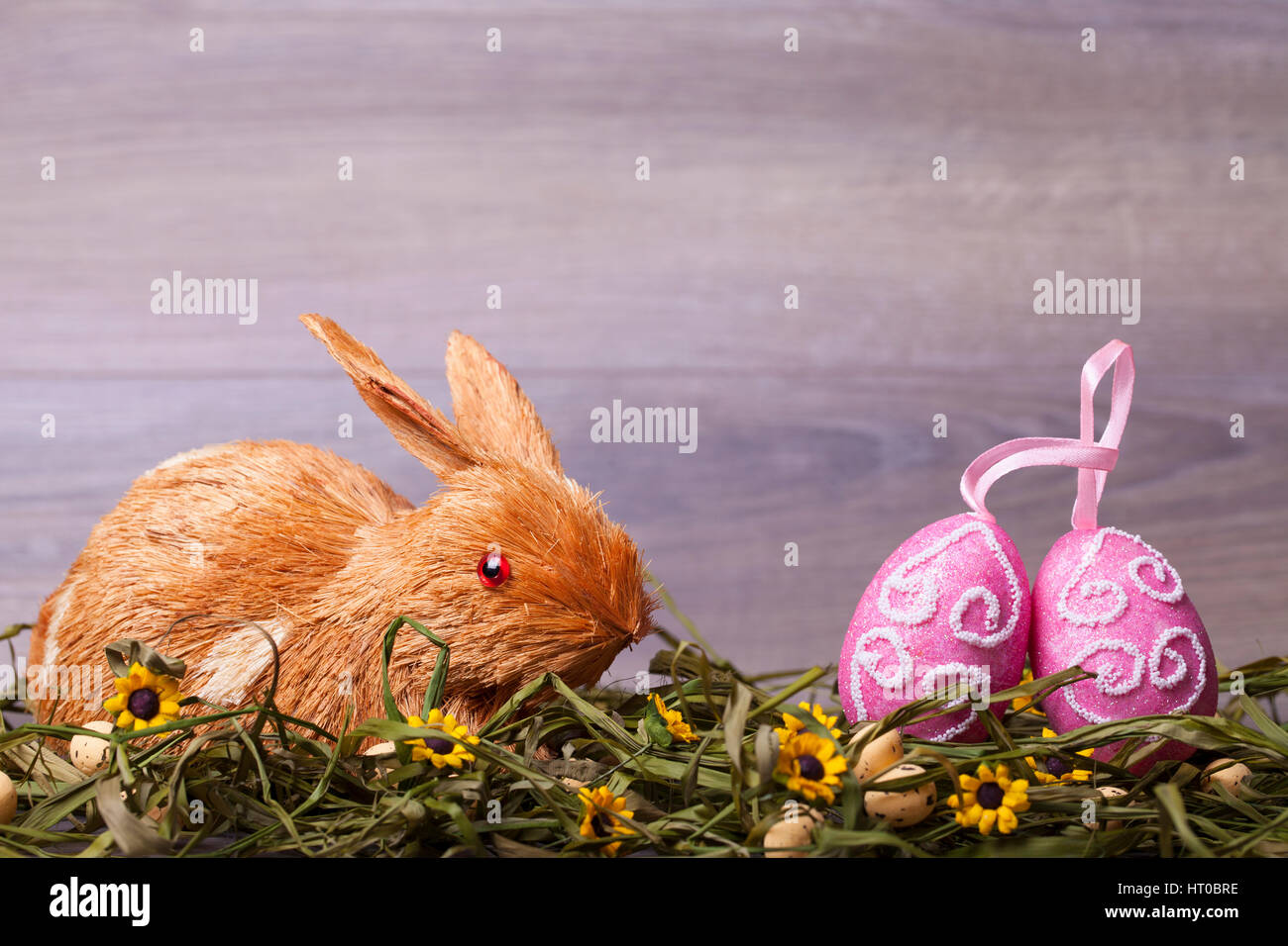 Easter decoration with eggs on a wooden background Stock Photo - Alamy