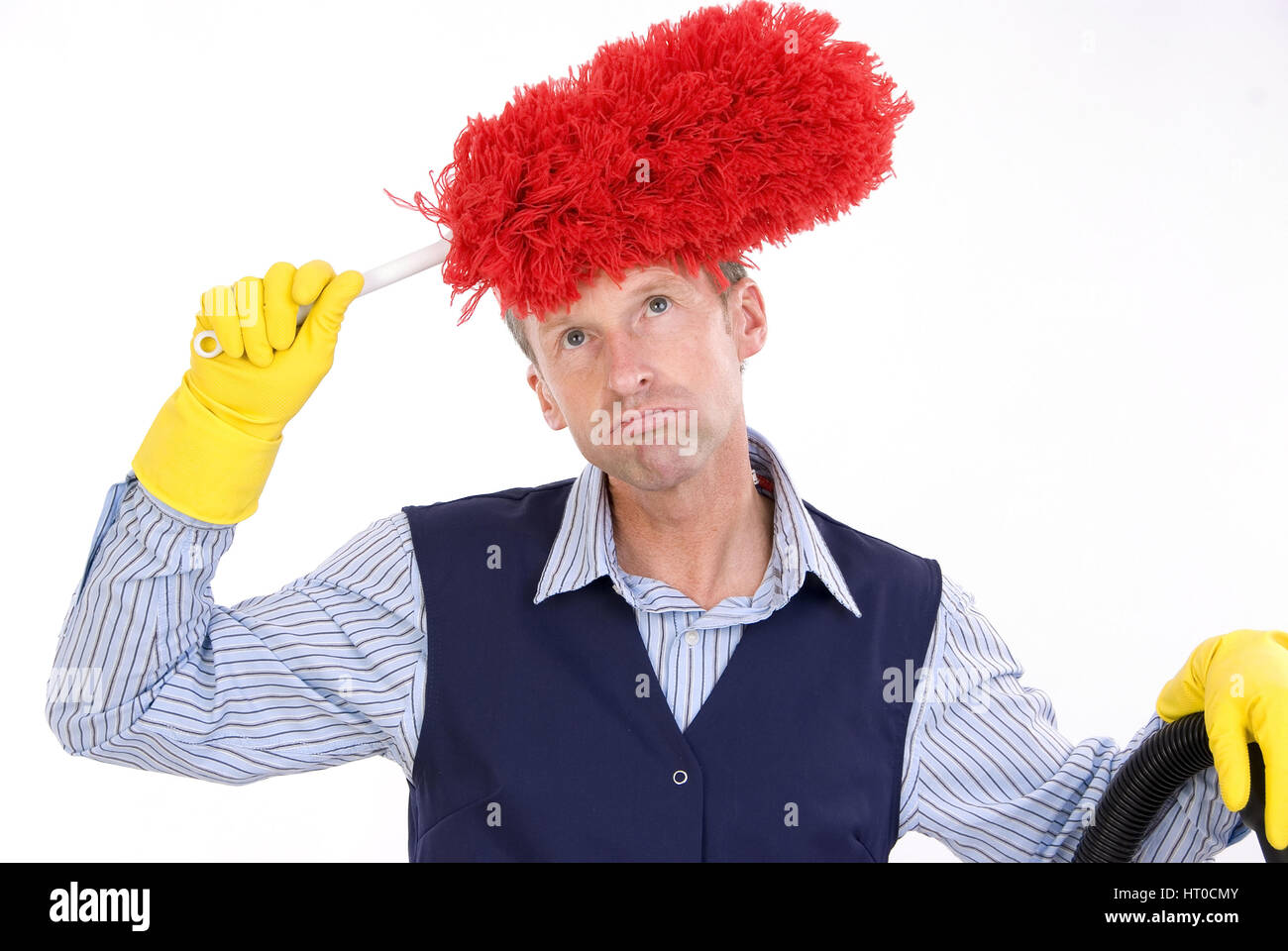 ‹berforderter Mann beim Putzen - charman Stock Photo