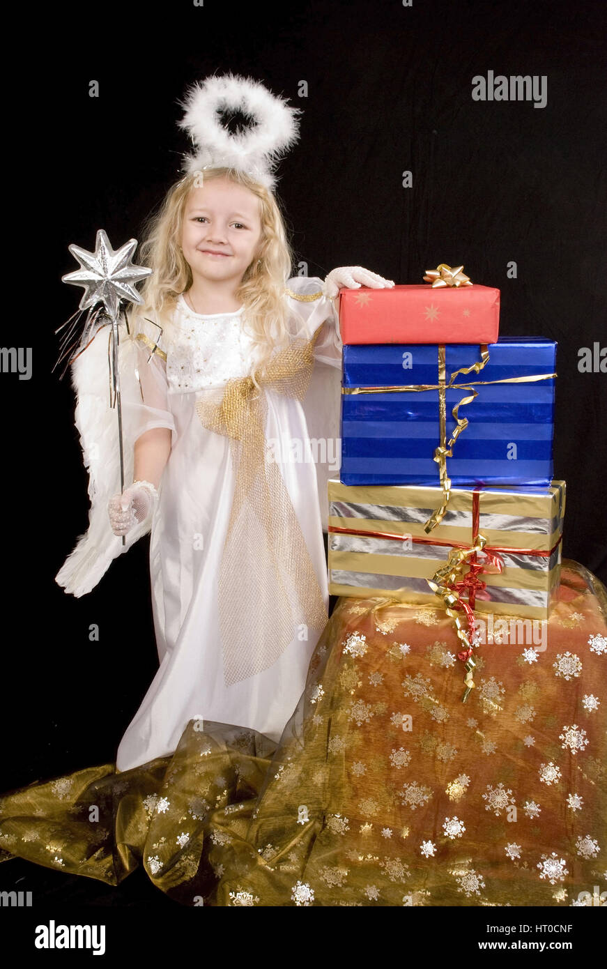 Christkind mit Geschenken - christ child with presents Stock Photo - Alamy