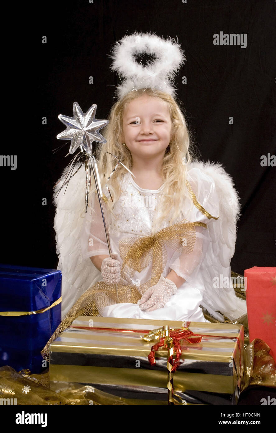 Christkind mit Geschenken - christ child with presents Stock Photo - Alamy