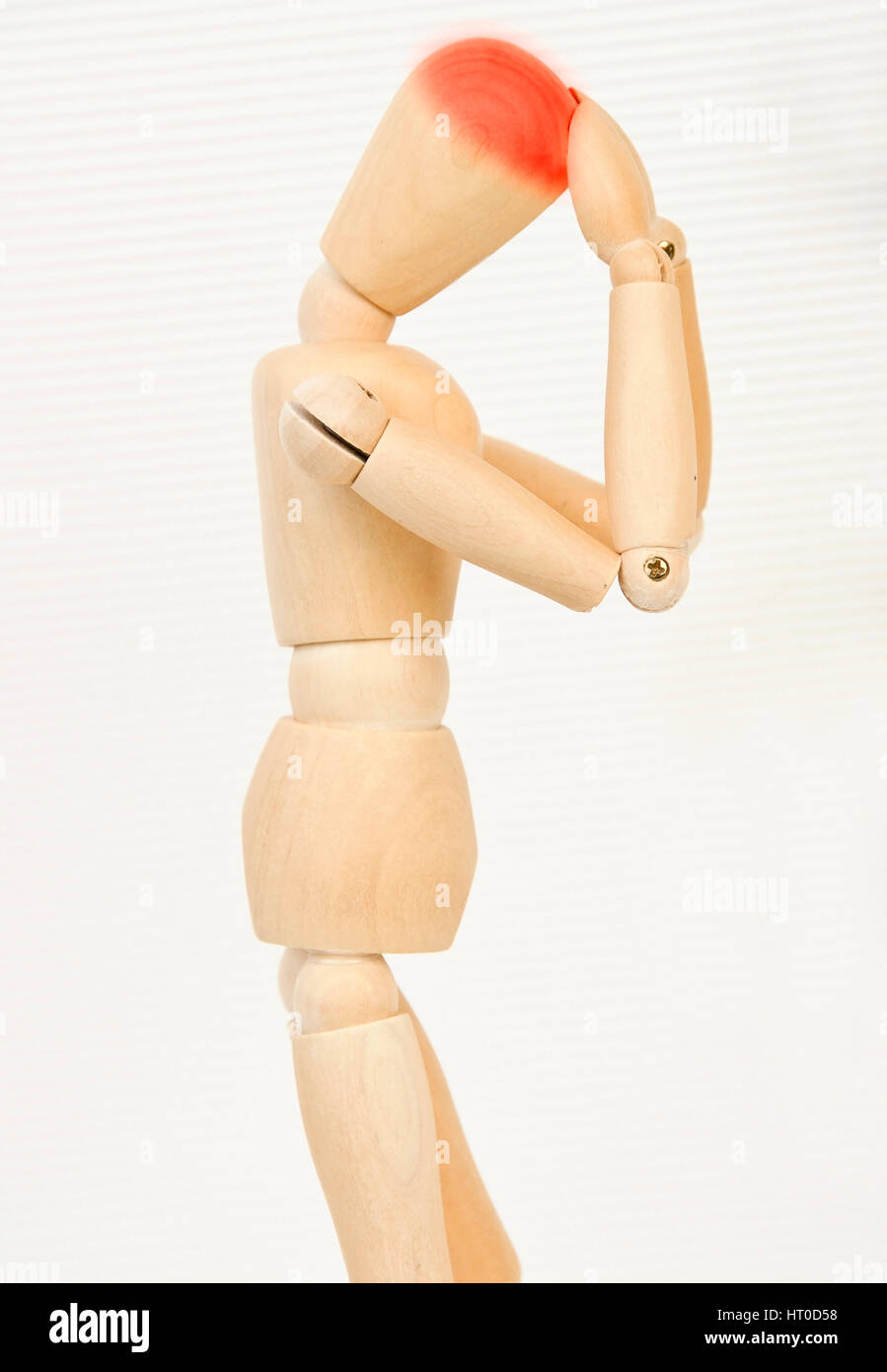 Gliederpuppe mit Kopfschmerzen - jointed doll with headache Stock Photo