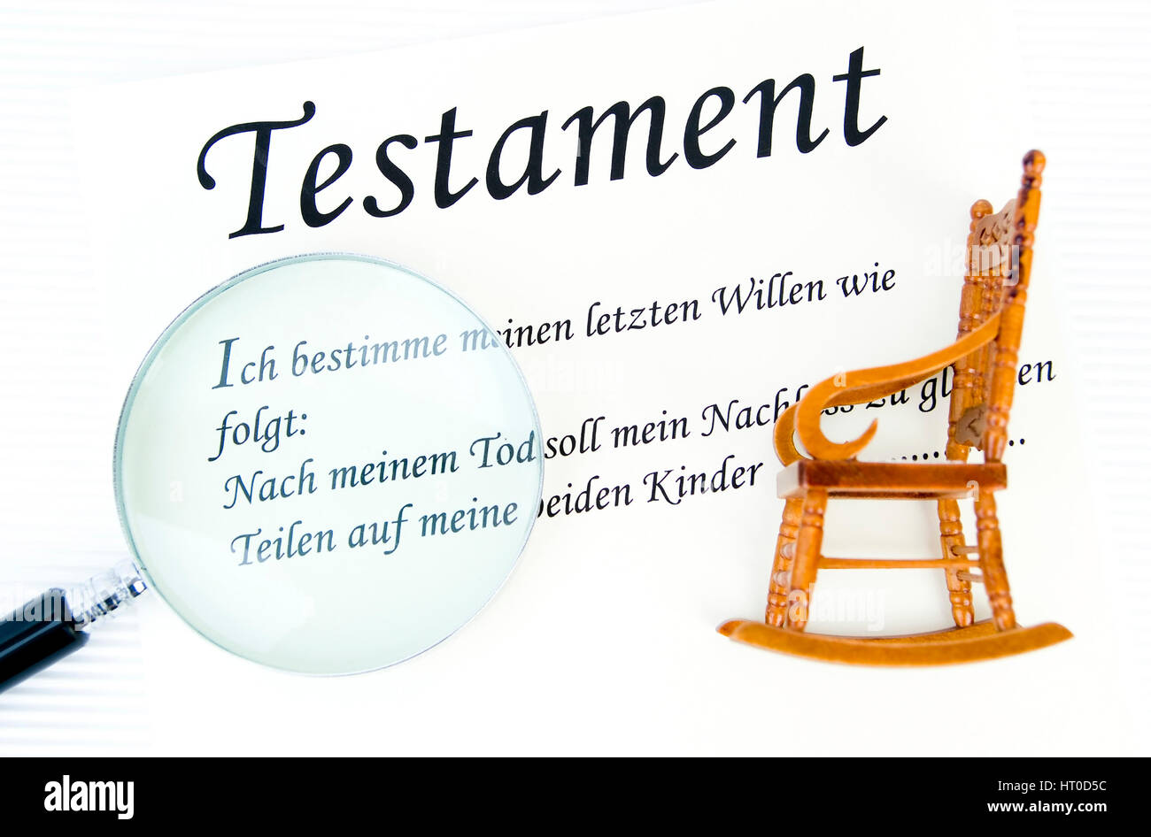 Symbolbild Testament unter der Lupe - symbolic for testament under loupe Stock Photo