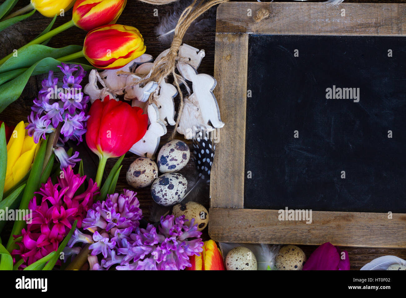 Spring flowers with easter eggs Stock Photo - Alamy