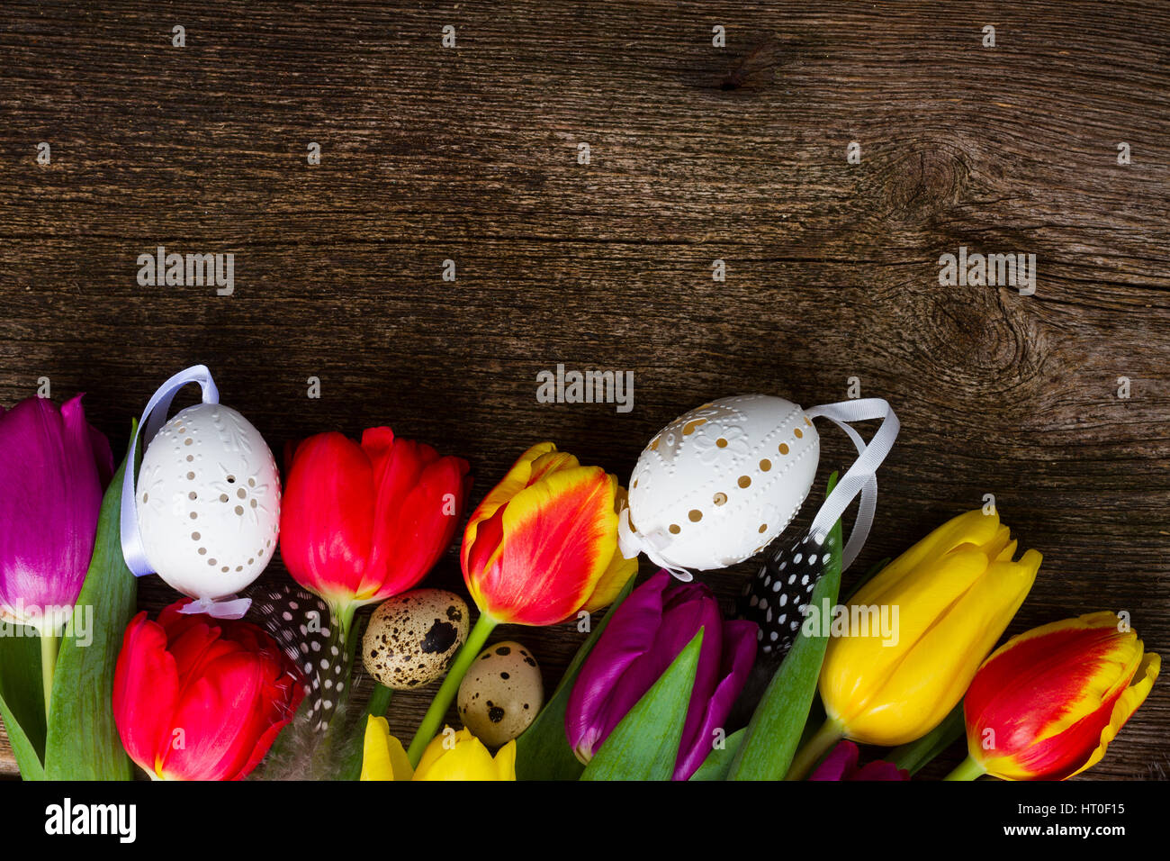 Spring flowers with easter eggs Stock Photo - Alamy